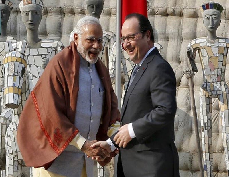 France to invest $1 bn per year in India, signs 16 MoUs: Addressing business leaders of the two countries in presence of French President Francois Hollande, Narendra Modi said his government wants to ensure that foreign investors are clear about tax systems that will prevail in India over the next 15 years. He also announced that France would immediately start investing $1 billion in India annually which will be scaled up later. The two sides also signed 16 MoUs, including one for manufacture of helicopters in India. (Reuters)