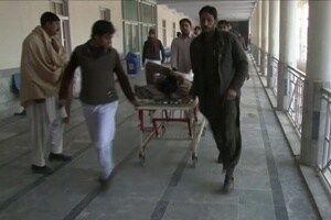 People wheel a man injured in a militant attack at Bacha Khan University, at a hospital in Charsadda, northwestern Khyber Pakhtunkhwa province, Pakistan.(Reuters)