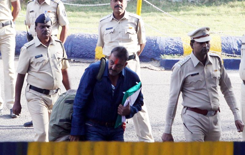 Back home in Mumbai, Sanjay Dutt's residence in suburban Bandra was decorated with flowers to welcome him after his visit to the Siddhivinayak Temple and his mother's grave at Marine Lines in South Mumbai. Lanes leading to his house were lined with hoardings like "Welcome Back Sanju Baba", "Bandraites Welcome Back Bandra Boy Sanjay Dutt" with a picture of young Dutt with mother Nargis. (Express Photo)