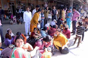 Stranded passengers at Mathura railway station due to cancellation of trains on account of the ongoing Jat protests in Haryana. (PTI) Stranded passengers at Mathura railway station due to cancellation of trains on account of the ongoing Jat protests in Haryana. (PTI)