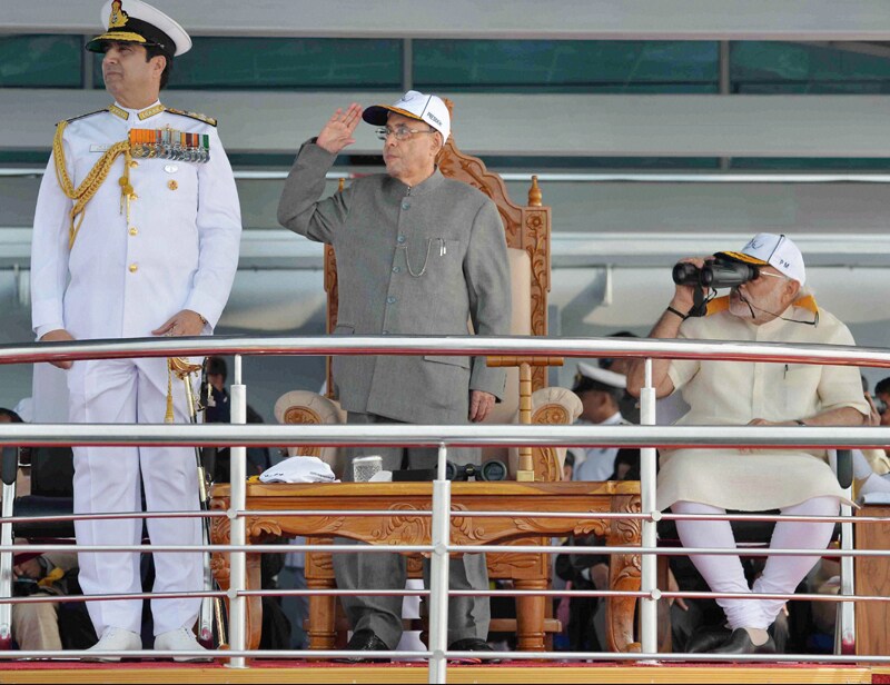 President Pranab Mukherjee, onboard the presidential yacht INS Sumitra, inspected the fleet of 71 Indian naval ships. Also on the yacht were Prime Minister Narendra Modi, Defence Minister Manohar Parrikar and three other service chiefs. (PTI)