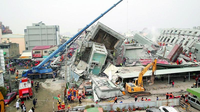 Tainan city Mayor Mayor Lai Ching-te on Saturday bowed deeply and thanked the rescuers for their work, and ordered a minute of silence for the victims. (PTI) Tainan city Mayor Mayor Lai Ching-te on Saturday bowed deeply and thanked the rescuers for their work, and ordered a minute of silence for the victims. (PTI)