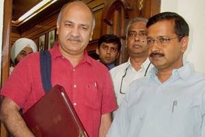 Delhi Budget 2016: CM Arvind Kejriwal with Dy CM and Finance Minister Manish Sisodia leave for the budget session of the Assembly, in New Delhi on Monday. PTI