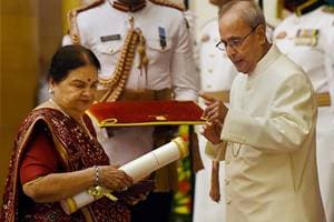 New Delhi: Kokilaben Ambani receives Padma Vibhushan award conferred on her husband and founder of Reliance Group, late Dhirubhai Ambani by President Pranab Mukherjee during Padma Awards 2016 function at Rashtrapati Bhavan in New Delhi on Monday. PTI Photo by Subhav Shukla (PTI3_28_2016_000009A)