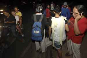 Residents take shelter on higher ground after an earthquake struck off the west coast of Sumatra, in the city of Padang, West Sumatra, Indonesia. (Reuters)