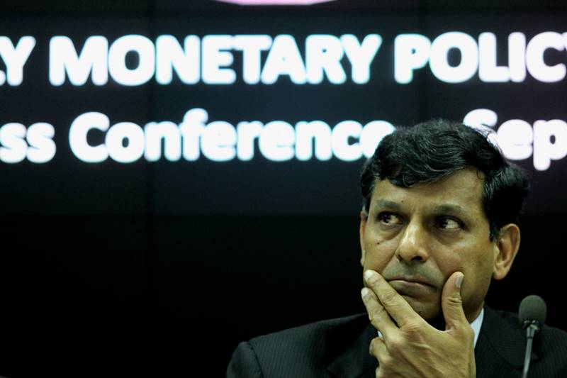 RBI policy review: Governor Raghuram Rajan cut repo rate by 25 basis points to 6.50 percent and here are the reactions to the move by experts. * SHUBHADA RAO, CHIEF ECONOMIST, YES BANK, MUMBAI: "The policy sounds dovish. Greater focus is on liquidity management, more importantly the commentary is clearly guiding on further rate cuts, with four riders, namely: good monsoon, low headline CPI, softening core CPI and improving rate transmission. On these four parameters further rate cuts would play out." * RADHIKA RAO, ECONOMIST, DBS BANK, SINGAPORE: "In all, today's decision was more focused on addressing liquidity shortage and easing the transmission mechanism. There is a significant shift in their emphasis on the NDTL framework, narrowing the corridor around the operational repo rate and CRR changes. This is to ensure that the easy policy stance percolates to the real economy and materially lowers financing costs. These changes are likely to provide positive impetus to the financial markets in the near-term." * RAJEEV TALWAR, CHIEF EXECUTIVE OFFICER, DLF LTD, NEW DELHI: "The repo rate cut is a good one if it is passed on by the banks and bank rates come down. The governor has been very conservative. The government has been much more proactive by easing FDI rules and taking other measures. The economy is on a recovery path despite the RBI. This round goes to the finance minister." (Express Photo)