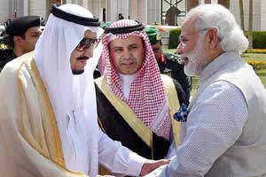 Prime Minister Narendra Modi being greeted by King of Saudi Arabia Salman bin Abdulaziz Al Saud at his palace for the ceremonial welcome in Riyadh. (PTI)