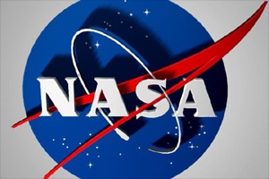 NASA scientists have found new insights into how the Moon got its mysterious "tattoos" - swirling patterns of light and dark found at over a hundred locations across the lunar surface. (AP)