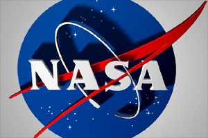 NASA scientists have found new insights into how the Moon got its mysterious "tattoos" - swirling patterns of light and dark found at over a hundred locations across the lunar surface. (AP)