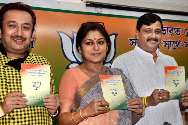 West Bengal Assembly elections: The Bharatiya Janata Party (BJP) state unit released its manifesto highlighting that the party would seek to drive out all infiltrators from the state and strive for bringing parity between central and state dearness allowances if voted to power. BJP has fielded candidates for almost all the 294 Assembly seats going to polls which kick off next week. Check out the top points in BJP manifesto: (Source: PTI)