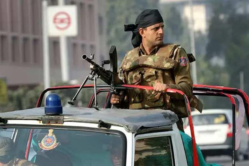 A Delhi police commando keeps vigil outside CEntral Secretariat metro station, on the eve of Republic day, in New Delhi on Jan 25th 2016. Express photo by Ravi Kanojia. *** Local Caption *** A Delhi police commando keeps vigil outside CEntral Secretariat metro station, on the eve of Republic day, in New Delhi on Jan 25th 2016. Express photo by Ravi Kanojia.