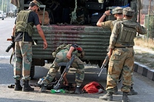 Security forces had surrounded the house in Konchipora village in the morning following information about two Hizbul Mujahideen (HM) militants hiding in it. (IE)