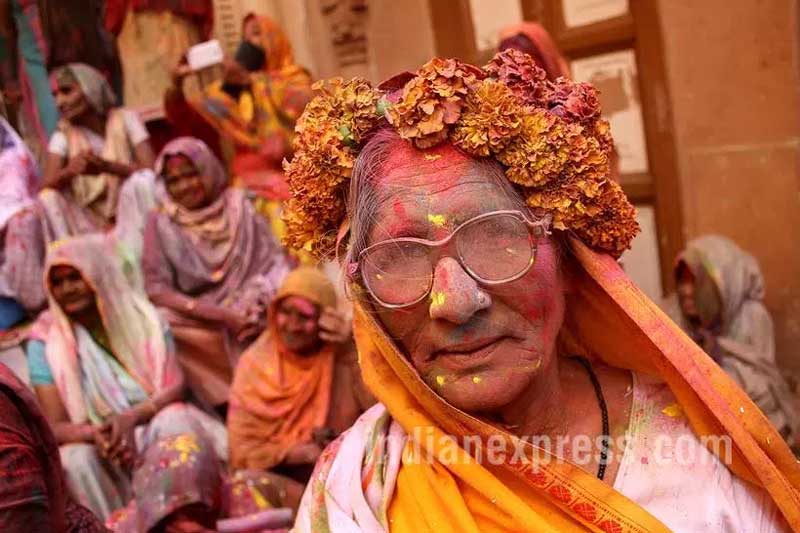 The country's millions of observant Hindu widows are expected to live out their days in quiet worship, dressed only in white. They are typically barred from all religious festivities because their very presence is considered inauspicious. (Source: Express photo by Ravi Kanojia)