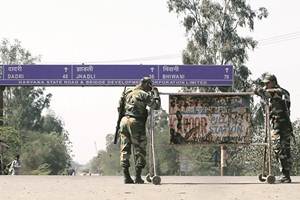 Nearly 20,000 security personnel from central and state forces kept a a close vigil across the state, including on national highways and railway tracks which the protesters had blocked for several days in February. (Source: IE) Nearly 20,000 security personnel from central and state forces kept a a close vigil across the state, including on national highways and railway tracks which the protesters had blocked for several days in February. (Source: IE)