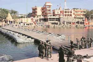 Army personnel prepare a pontoon bridge at the banks of holy river of Kshipra as a part of preparations for Simhastha Maha Kumbh in Ujjain on Wednesday. (Source: PTI)
