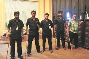 The cooks, gardeners, security staff, drivers and caretakers of the Kingfisher Villa hurried away, avoiding any contact with either the curious onlookers or the media. (Express Photo)