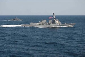 The Pentagon last month called on China to reaffirm it has no plans to deploy military aircraft in the disputed Spratly Islands after Beijing used a military plane to evacuate sick workers from the Fiery Cross airstrip.(Reuters)
