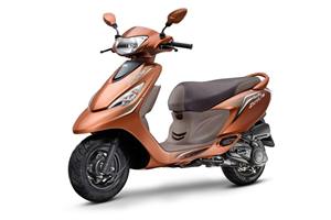 The TVS Scooty Zest 110 Himalayan Highs edition comes in Himalayan High Brown colour with beige panels.