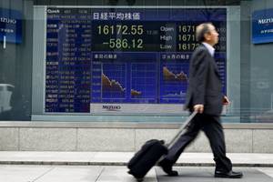 Japan stocks lead Asia lower, kiwi flies as central bank stands pat