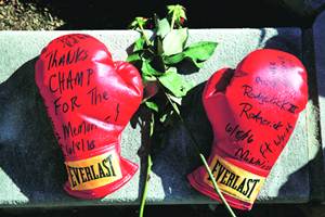 Boxing gloves with wishes at a memorial for late boxing champion 
Muhammad Ali in Louisville, Kentucky, US