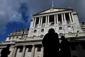 Bankers in New York were also burning the midnight oil with special numbers laid out for clients to call, foreign exchange desks fully staffed and senior management keeping a fretful eye on screens. (Reuters)