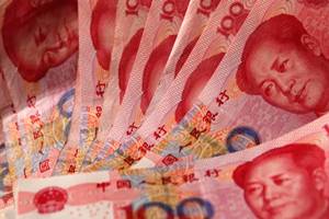 The Chinese currency will be officially included into the International Monetary Fund's reserves basket, known as Special Drawing Rights (SDR), on Oct. 1. (Source: Reuters)