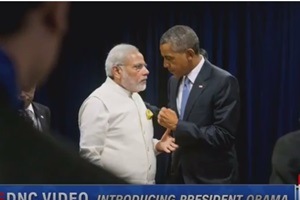 A video grab showing US President Obama with the Indian PM Narendra Modi in the former's introduction video at Democratic National Convention.