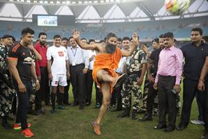 Baba Ramdev turns footballer for charity event