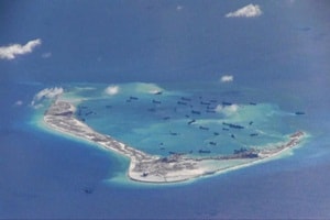 While outlining India's principled position on the raging issue over the South China Sea, the Prime Minister in his address at the 11th East Asia Summit (EAS) said "the threat or use of force" to resolve would complicate matters affecting peace and stability. (Reuters)
