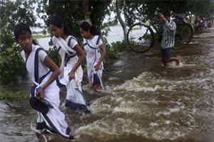 With 300 villages and more than one lakh people affected, Assam is yet to witness a dry patch. (Reuters) With 300 villages and more than one lakh people affected, Assam is yet to witness a dry patch. (Reuters)