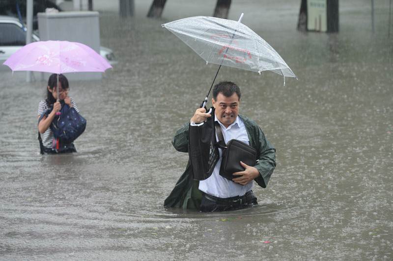 china rain, china floods, china rain 2016, china rain 2016, china rainfall, china rain storm, china weather news, financial epxress