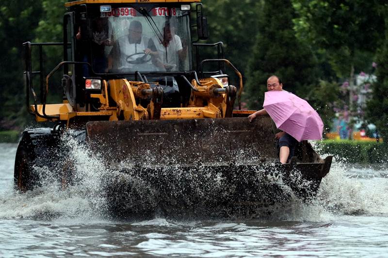china rain, china floods, china rain 2016, china rain 2016, china rainfall, china rain storm, china weather news, financial epxress