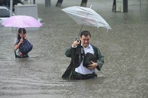 china rain, china floods, china rain 2016, china rain 2016, china rainfall, china rain storm, china weather news, financial epxress