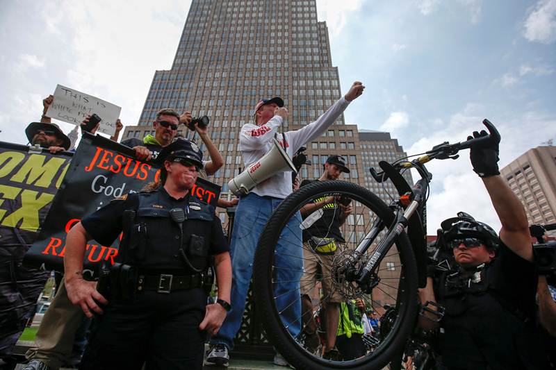 Donald Trump, protest against Donald Trump, Protest in Cleveland, melania trump, melania trump campaigns, melania trump campaigns cleveland, nude women, nude women protest, nude women protest cleveland, us presidential elections, USA news, world news, financial express