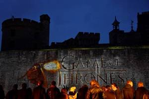 "Game of Thrones" writer D.B. Weiss thanked Time Warner-owned HBO on stage for "the support and resources to keep this giant lizard flying." (Reuters) "Game of Thrones" writer D.B. Weiss thanked Time Warner-owned HBO on stage for "the support and resources to keep this giant lizard flying." (Reuters)