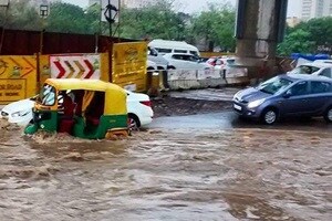 The rain has spelled trouble for residents as several parts of the city are logged with water and in many areas people have to wade through overflowing drain water. (Source: Twitter/Atish)