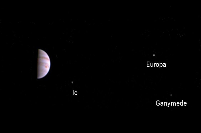 The image was taken on July 10 when the spacecraft was 4.3 million km from Jupiter on the outbound leg of its initial 53.5-day capture orbit. The colour image shows atmospheric features on Jupiter, including the famous Great Red Spot, and three of the massive planet's four largest moons -- Io, Europa and Ganymede, from left to right in the image. (Source: Twitter)