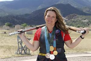 Californian shotgun shooter Kim Rhode, who boasts a collection of over 5,000 first-edition children's books, has a similar appetite for Olympic medals (Reuters)
