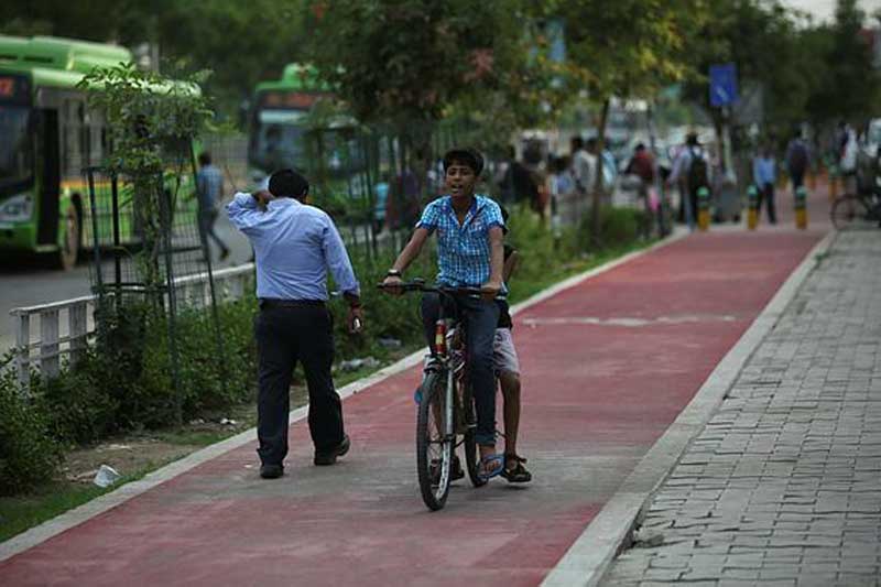 noida, noida footpaths, noida cycle tracks, cycle tracks in noida, noida footpath painted, gautam budh nagar, akhilesh yadav, uttar pradesh elections, financial express news, india news