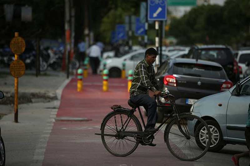 noida, noida footpaths, noida cycle tracks, cycle tracks in noida, noida footpath painted, gautam budh nagar, akhilesh yadav, uttar pradesh elections, financial express news, india news