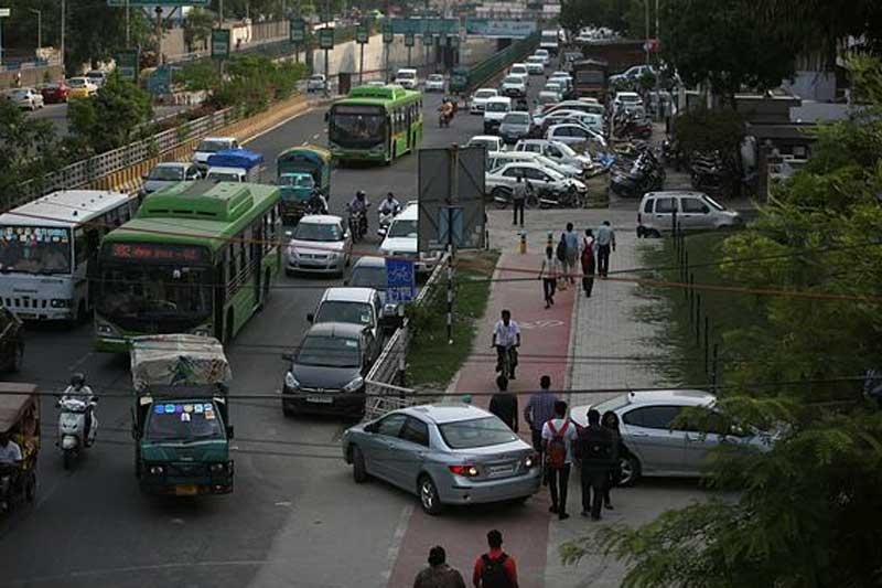 noida, noida footpaths, noida cycle tracks, cycle tracks in noida, noida footpath painted, gautam budh nagar, akhilesh yadav, uttar pradesh elections, financial express news, india news