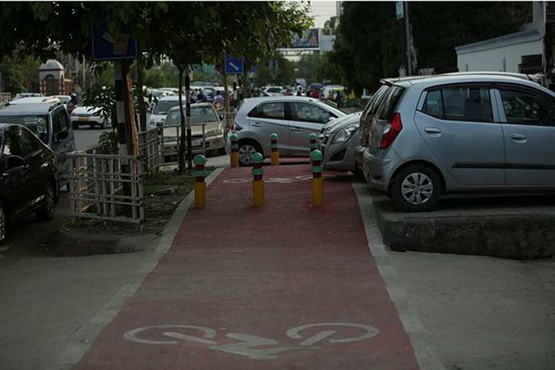 noida, noida footpaths, noida cycle tracks, cycle tracks in noida, noida footpath painted, gautam budh nagar, akhilesh yadav, uttar pradesh elections, financial express news, india news