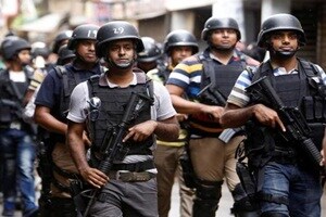 Nine alleged militants were killed while one was held on Tuesday morning during a special drive of the joint forces in Dhaka’s Kalyanpur, ending an overnight standoff that ensued with a raid to hunt down "militant den". (Reuters)