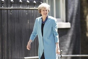 British Prime Minister Theresa May told leaders on Tuesday that her country will not turn away from the world after the shock vote to leave the European Union, seeking to allay fears over the future unity of the West. (Reuters)