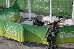 Rio Olympics: The black camera, known as a 'spidercam' and used to take aerial shots of the park, came crashing down just outside the basketball stadium early in the afternoon. (Source: Reuters)
