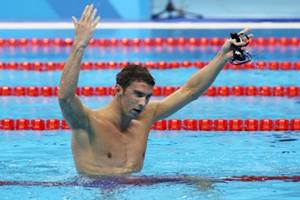 Phelps bagged his 23rd gold medal by helping the US to victory in the 4x100m medley relay -- the last race of the competition at the Olympic Aquatics Stadium on Saturday. (Source: Reuters)