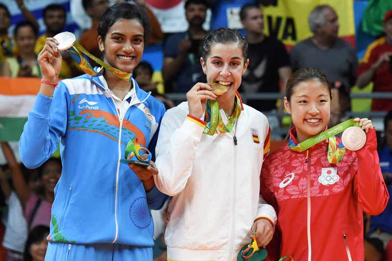 PV Sindhu, PV Sindhu wins, PV Sindhu for silver medal, PV Sindhu news, PV Sindhu match, PV Sindhu match today, PV Sindhu final, PV Sindhu badminton, PV Sindhu badminton match, PV Sindhu vs Carolina Marin, Carolina Marin vs PV Sindhu, live final match, live tv coverage, live streaming badminton match, rio olympics, olympics tv coverage, marin vs sindhu badminton match, sports news, sports live coverage, sonia gandhi, narendra modi, financial express