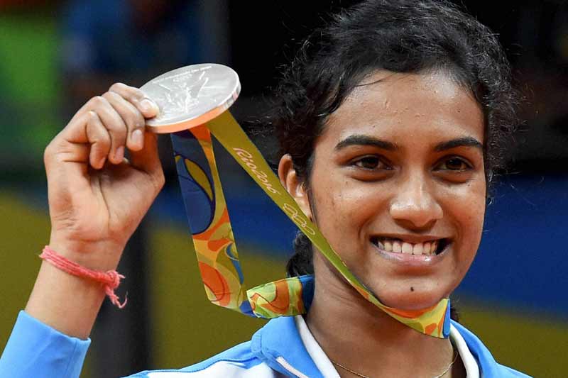 PV Sindhu, PV Sindhu wins, PV Sindhu for silver medal, PV Sindhu news, PV Sindhu match, PV Sindhu match today, PV Sindhu final, PV Sindhu badminton, PV Sindhu badminton match, PV Sindhu vs Carolina Marin, Carolina Marin vs PV Sindhu, live final match, live tv coverage, live streaming badminton match, rio olympics, olympics tv coverage, marin vs sindhu badminton match, sports news, sports live coverage, sonia gandhi, narendra modi, financial express