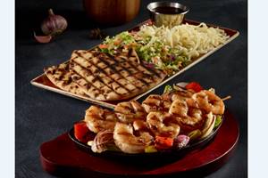 As a part of the Smoke, Fire and Spice menu, 6 sauces, namely- Charmoula, Harissa, Chimchurri, Satay, PiriPiri and Chiptole will be served with sizzling skillet,naan bread, marinated salad and cheese. As a part of the Smoke, Fire and Spice menu, 6 sauces, namely- Charmoula, Harissa, Chimchurri, Satay, PiriPiri and Chiptole will be served with sizzling skillet,naan bread, marinated salad and cheese.