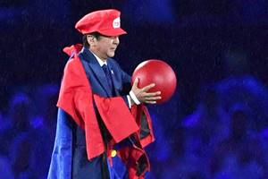 Japanese Prime Minister Shinzo Abe appears as the Nintendo game character Super Mario during the closing ceremony at the 2016 Summer Olympics in Rio de Janeiro, Brazil. Abe's brief but show-stopping appearance as Super Mario offered a glimpse at Tokyo's plans for the 2020 games. (AP) Japanese Prime Minister Shinzo Abe appears as the Nintendo game character Super Mario during the closing ceremony at the 2016 Summer Olympics in Rio de Janeiro, Brazil. Abe's brief but show-stopping appearance as Super Mario offered a glimpse at Tokyo's plans for the 2020 games. (AP)